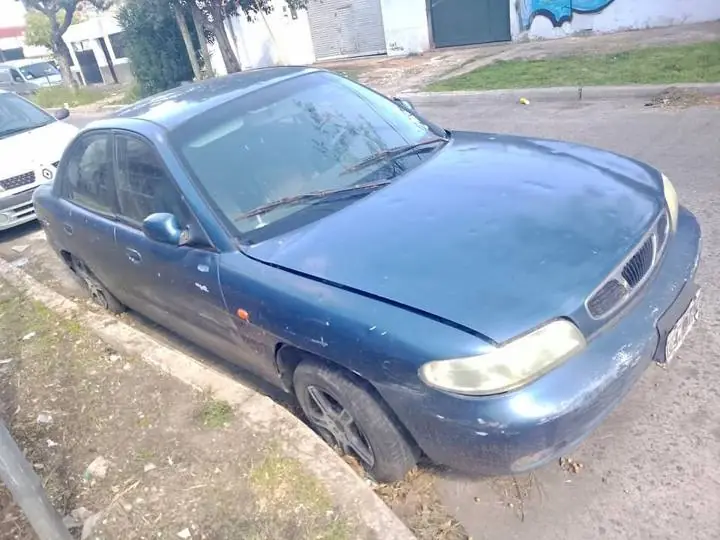 Liquido Daewoo nubira 1999 full full original 100X100 unico titular de 0KM a poner en marcha 900 mil