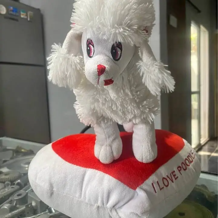 Peluche perro caniche