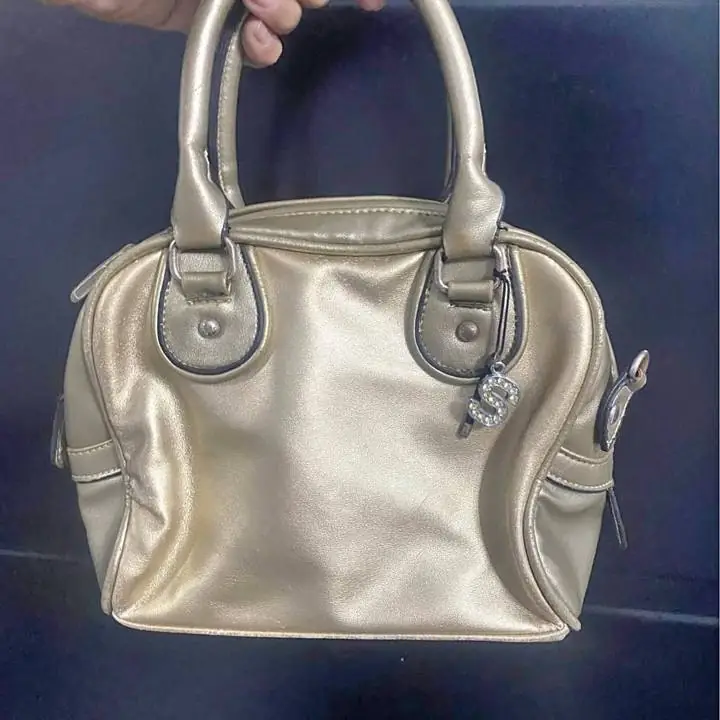 Cartera tropea dorada