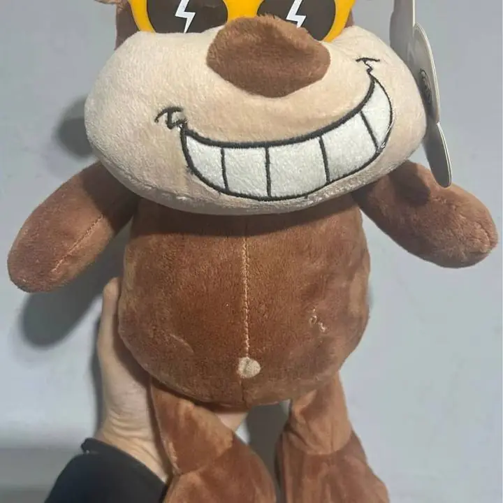 Peluche mono con lentes plasticos