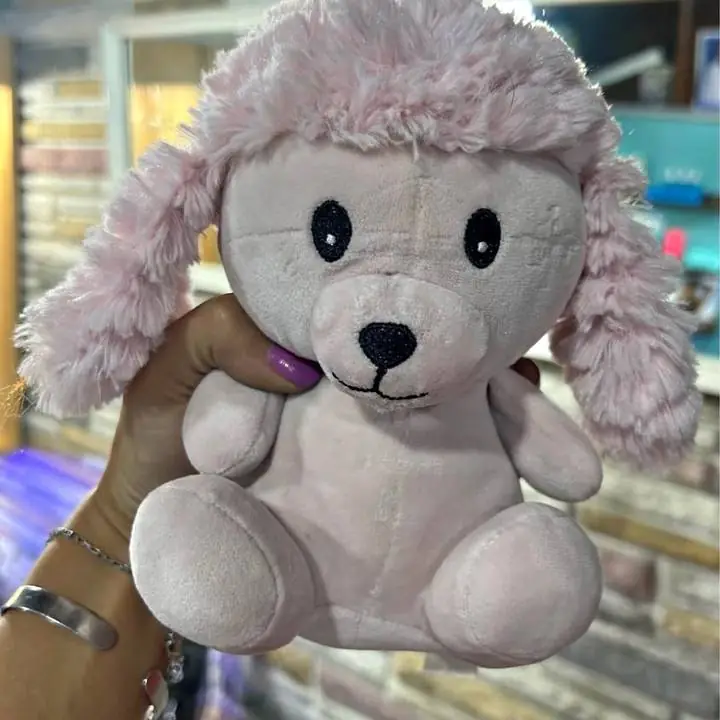 Peluche perro rosa