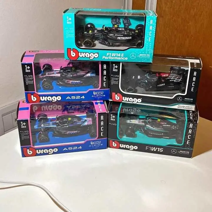 Líquido lote de autos escala 1/43 burago