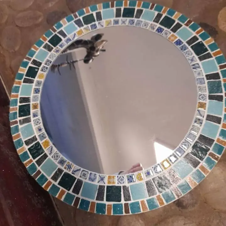 Espejo con mosaiquismo
